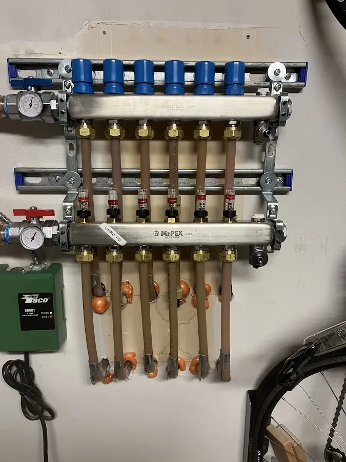 Plumber performing Gas Leak Detection at a residential property in Owosso